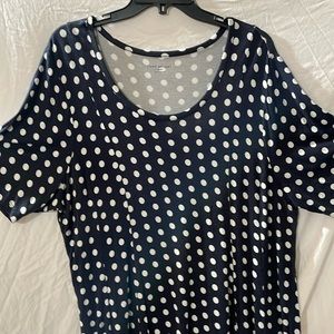 This is a size 18 blue with white polkadots Lane Bryant skirted shirt